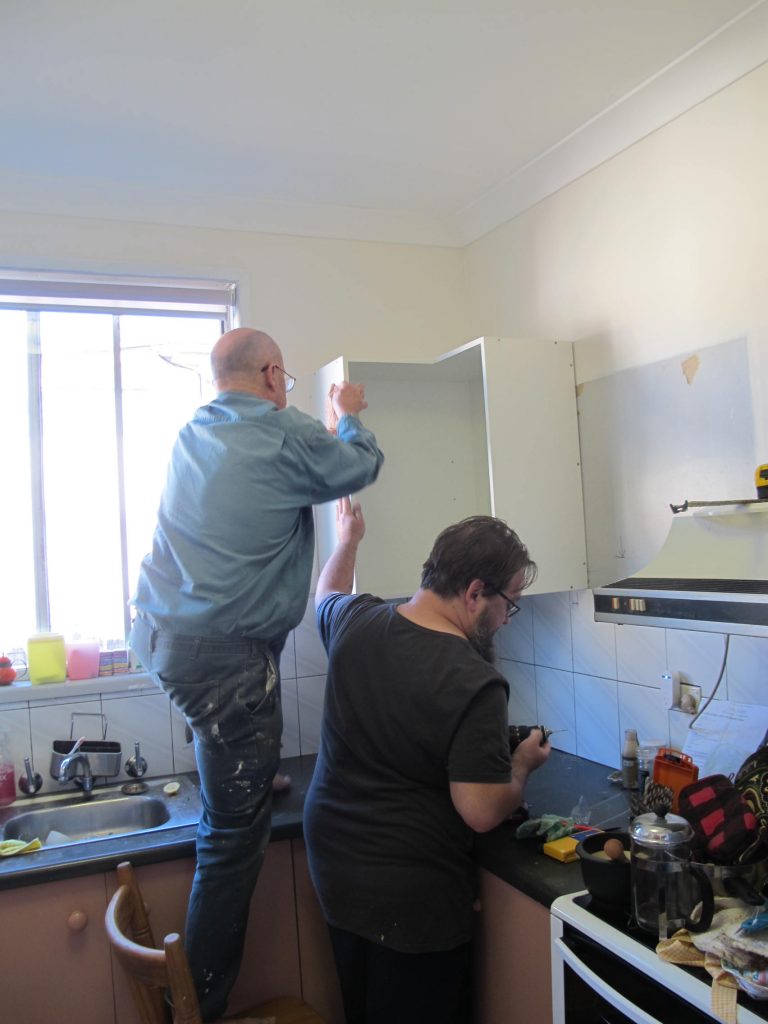 Getting in the corner cupboard with soft close doors - fancy!